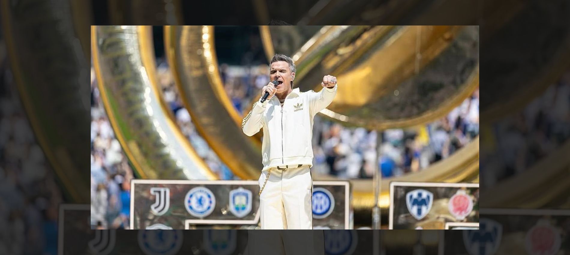Robbie Williams Set to Rock the First-Ever World Cup Halftime Show Alongside BTS, Madonna, and Shakira!